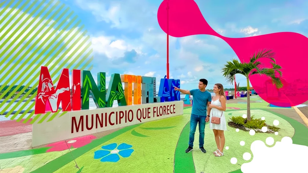 pareja frente a letrero minatitlán | JAPI