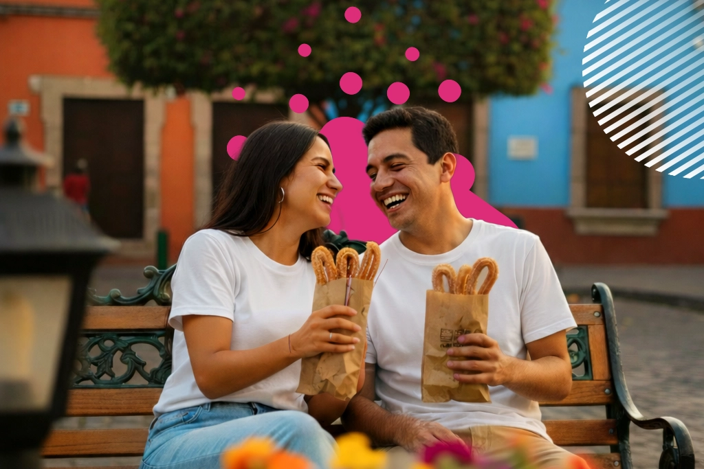 pareja sonriendo y comiendo churros | JAPI